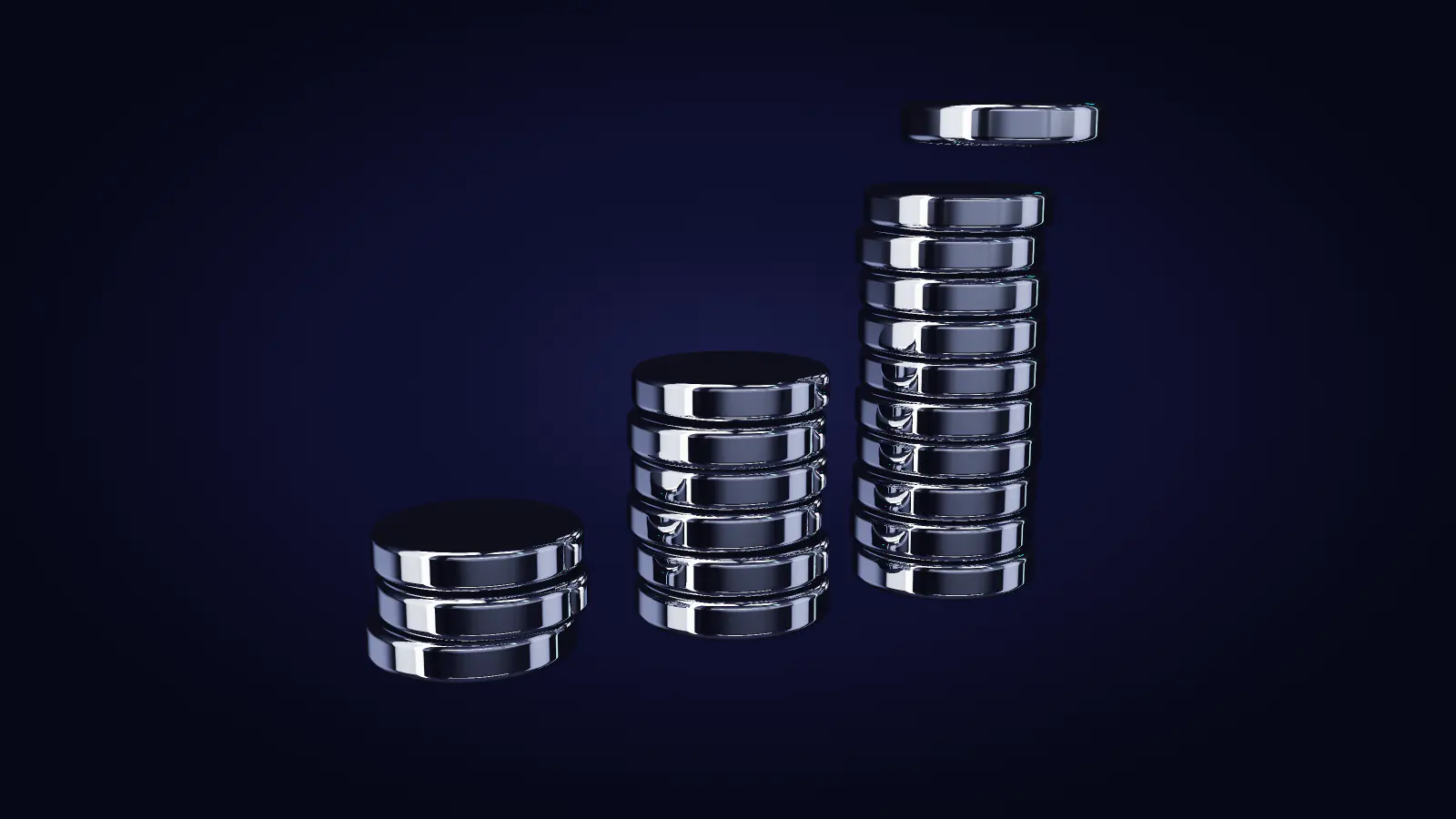 Three stacks of chrome discs, each taller than the last
